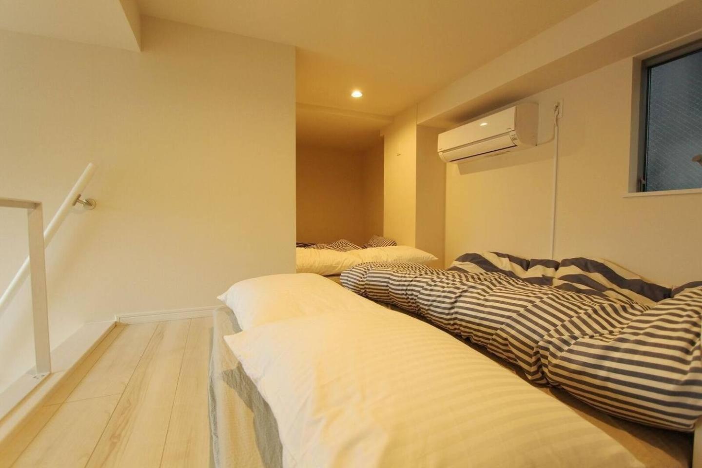 Building A101 / Vacation 1275 Apartment Tokyo